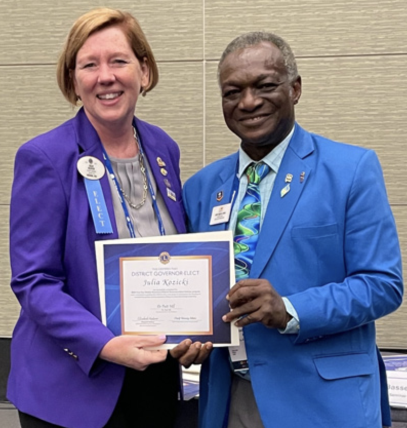 Image of Julia Church Kozicki with Chief Bassey Edem