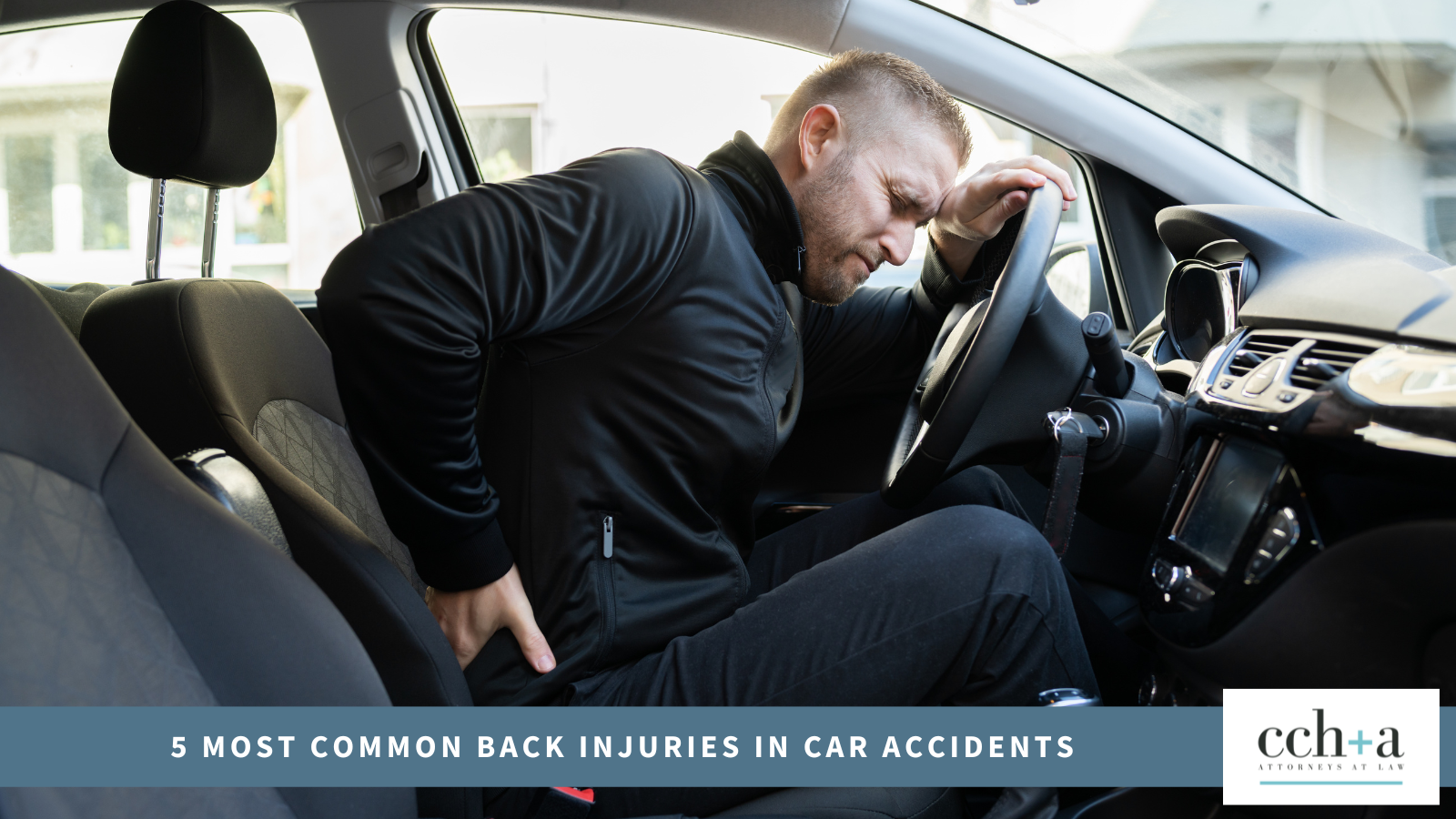 Image of a man in car with back pain