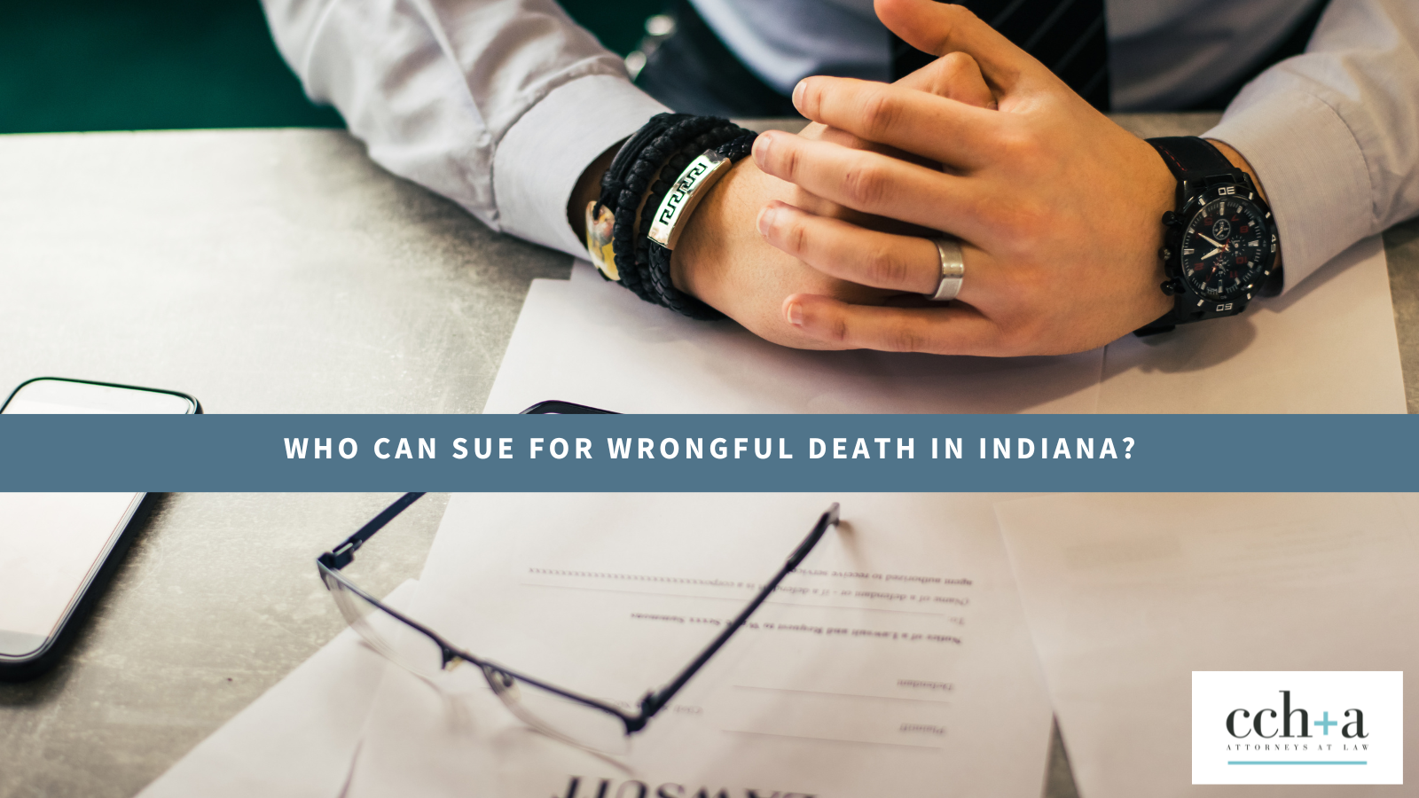 Image of wrongful death attorney and paperwork