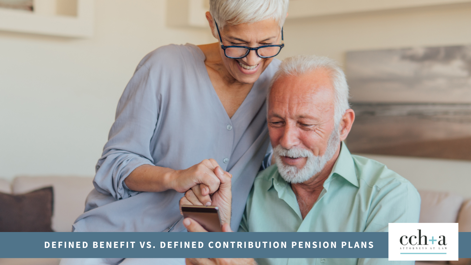 Mature couple looking at pension plan
