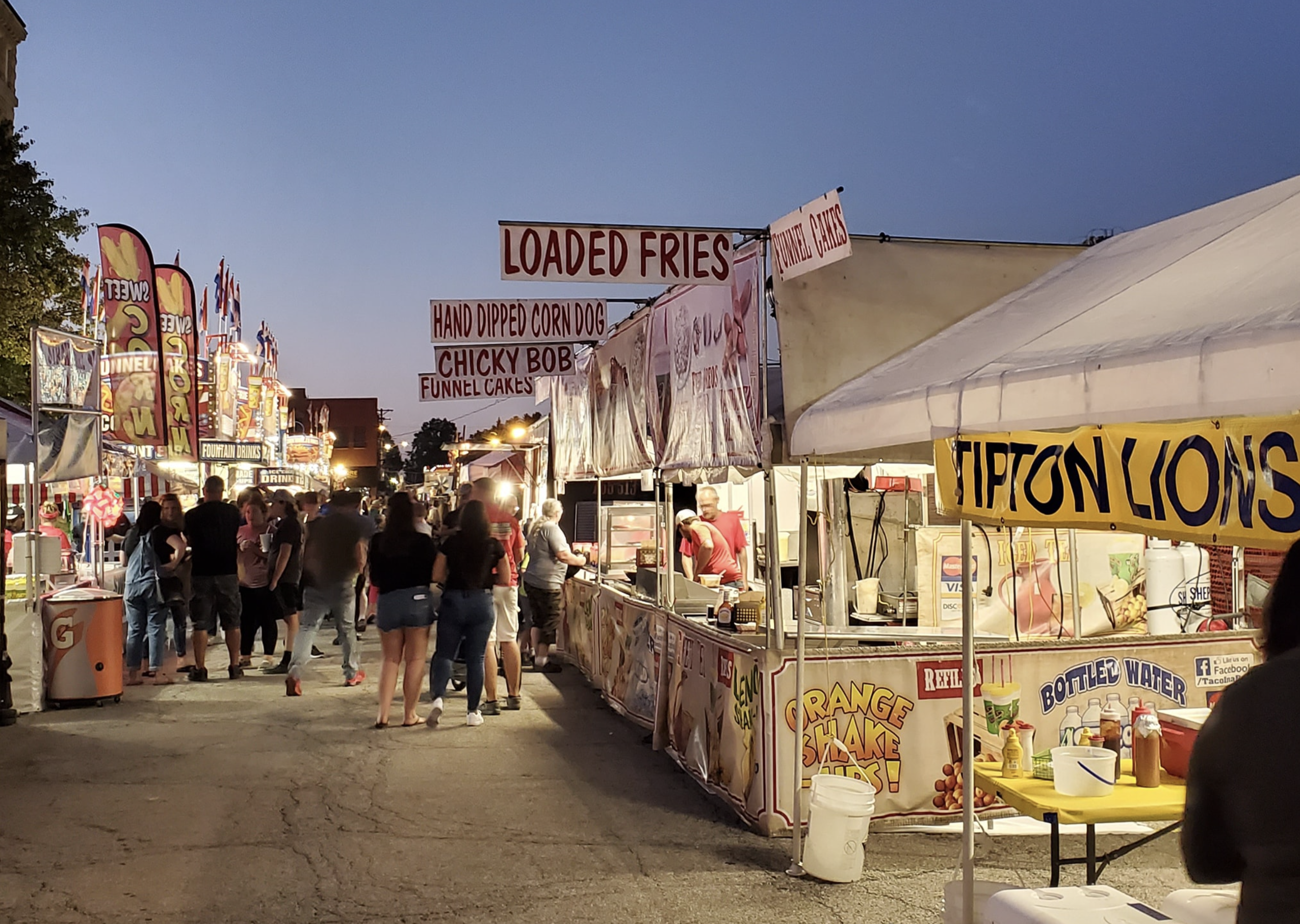 Image of food vendors set up at night